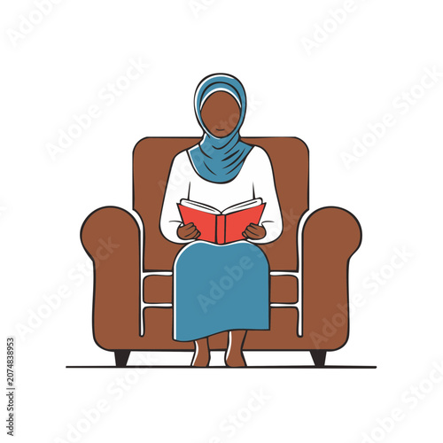 Woman in hijab reading a book in an armchair