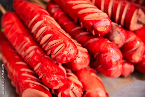 Salsichão – Red sausages served on wooden skewers. A popular street food during the June Festivals.