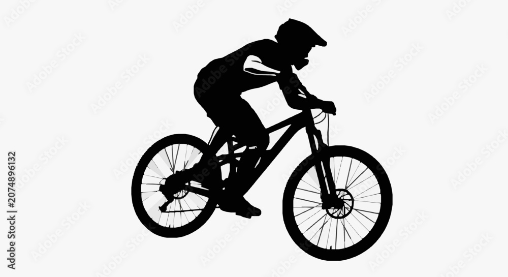 Fototapeta premium Silhouetted Cyclist in Mountain Biking Action.