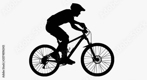 Foto Mountain Biker in Action Silhouette.