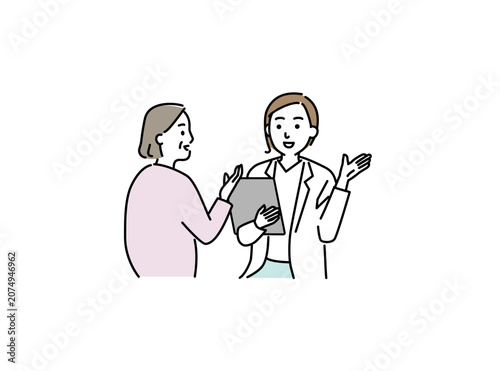患者に説明する女性医師
