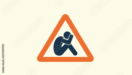 Safety warning sign featuring a stylized silhouette of a person sitting curled in a triangle frame, used for isolation or sadness.
