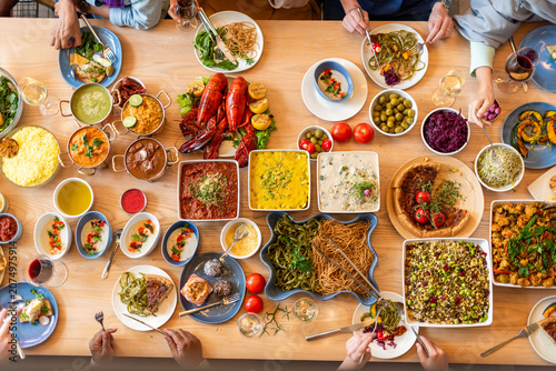 Canvastavla Vibrant multicultural feast table photo