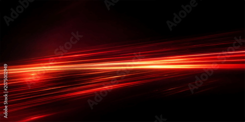 Obraz na plátně Abstract glowing red light streaks across a dark background, creating a sense of speed and energy