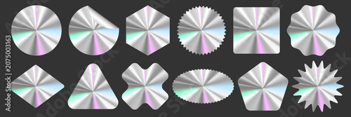 Картината върху платно A set of shiny silver holographic circles with varying sizes and shapes