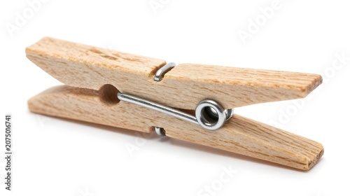 Wooden clothespin with metal spring and grip on white background