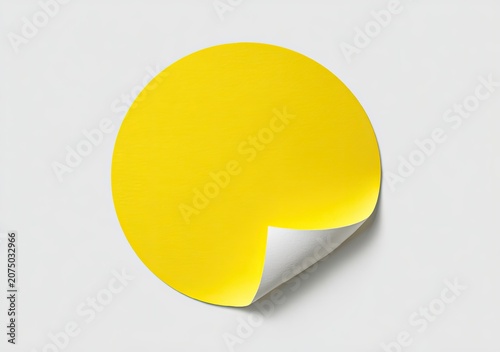 Blank Yellow Circular Sticker with Curled Corner on White Background.