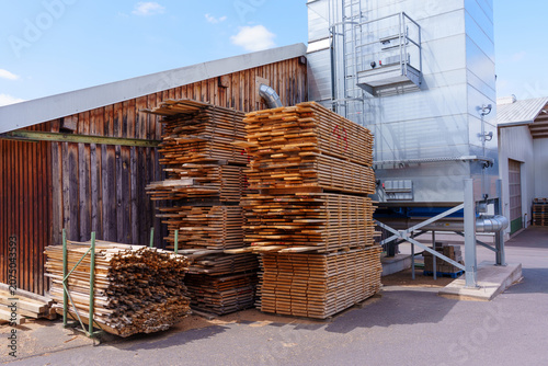 Timber Planks Stacked Outside Industrial Wood Factory in Germany