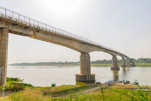 Pali Bridge spans the Chambal River during the Palighat Chambal Crocodile Safari, India, offering scenic views of the river and surrounding landscape.