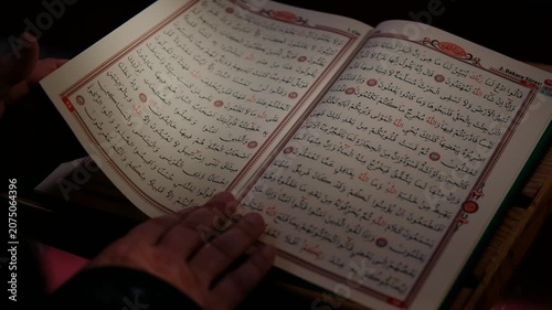 Finger Following an Arabic Religious Book