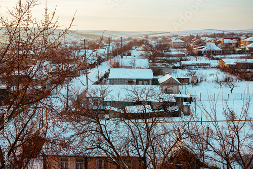 Winter in the village. View from above. East Europe.
