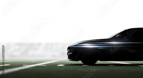 Sleek black car on a green field with white lines, modern vehicle design, automotive concept, luxury transportation