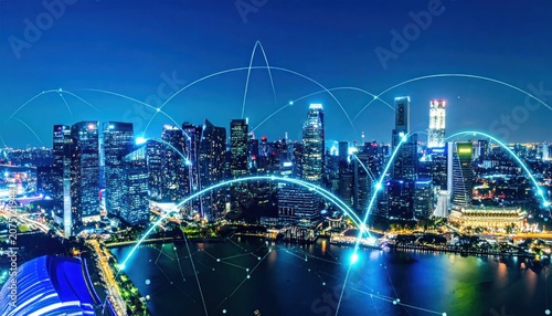 Cityscape at night with network connections.