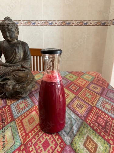 still life with a bottle of juice of roots