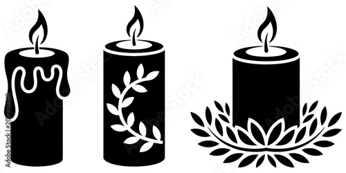Cuadro en lienzo Set of three black decorative burning candles with flame and floral leaf pattern