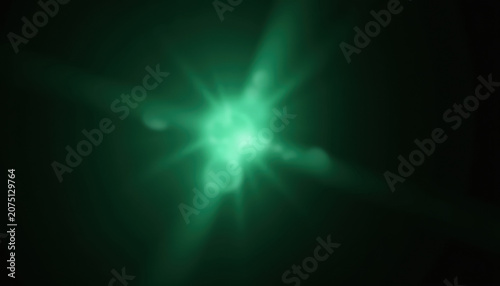 Bright green light burst radiating glowing rays on dark black background, abstract cosmic energy explosion with luminous beam