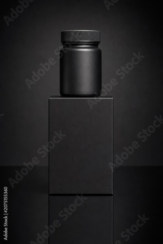 Minimalist Matte Black Cosmetics Jar Mockup on Matching Dark Podium, Luxury Cream, Balm, or Supplement Container Against Dark Gray Background