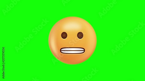 Nervous emoji face on green screen background.