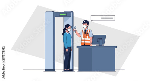 Security guard checks temperature with infrared thermometer at airport metal detector