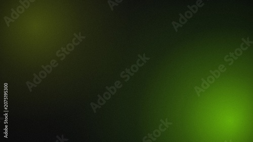 Foto Green light shining brightly in dark space with black background