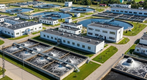 Aerial View of a Modern Water Treatment Plant Facility with Aeration Tanks and Circular Pools