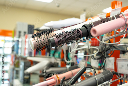 A Collection of Hair Styling Tools Featuring Innovative Brushes and Hot Air Stylers for Effortless Hair Care and Styling Solutions
