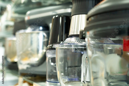 A Variety of Kitchen Appliances Featuring Transparent Food Processors and Blenders Perfect for Home Cooking and Meal Preparation