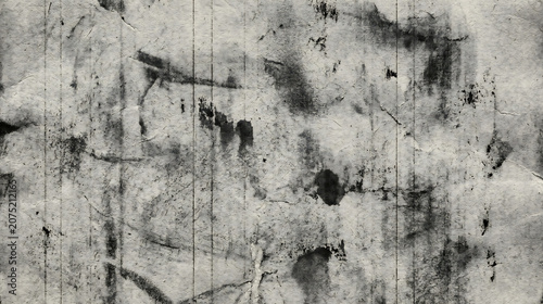 Foto Grunge texture with black stains and cracks on gray surface background