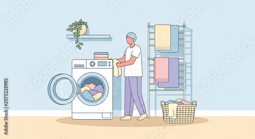 Person hanging laundry in modern utility room.