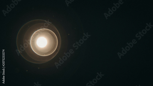 Bright Light Glow Through Dark Circular Tunnel with Dramatic Contrast and Minimalist Composition