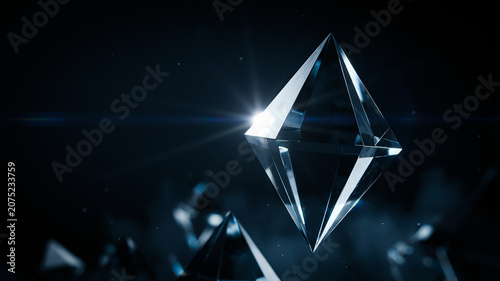 Close-up of a sparkling crystal prism reflecting light in dark setting