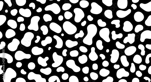 Abstract black and white cow print seamless pattern background. Minimalist animal skin spotted vector texture.

