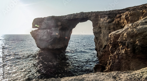 The famous  natural rock arch of a Dwejra bay on Gozo Island in the Malta