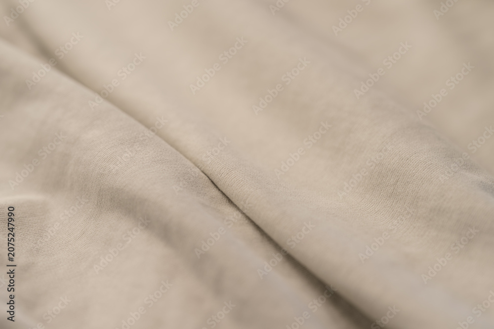 Fototapeta premium Closeup of beige french terry fabric for hoodies and similar clothes