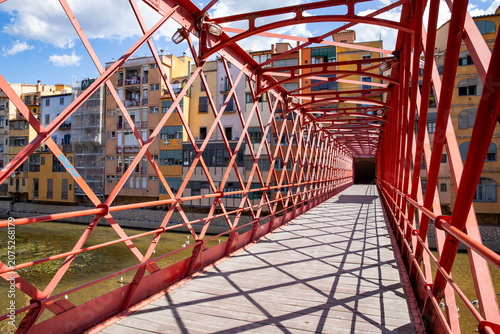 red iron eiffel bridge in girona view from inside the structure, Girona Spain