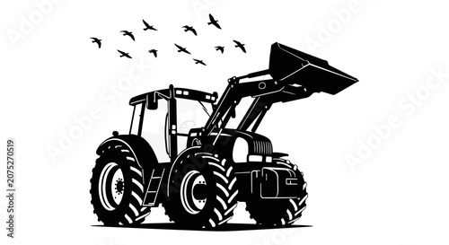 Foto Farm tractor with raised bucket and flock of birds black silhouette