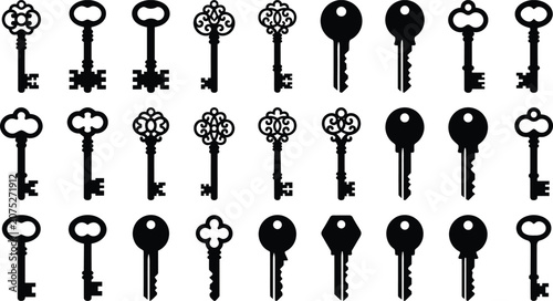 Foto Black and white of various old-fashioned keys on a white background, old keys vi