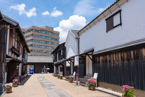 Принти на полотні Reconstructed Dejima street and modern office buildings