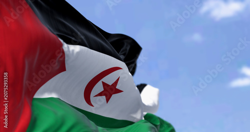 Foto Flag of Sahrawi Arab Democratic Republic waving in the wind on a clear day