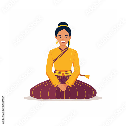 Woman in traditional Asian clothing sitting peacefully