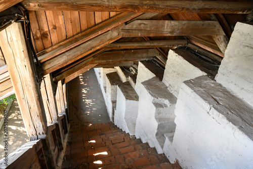 Interior of the medieval fortress wall with wooden roof of the Spaso-Preobrazhensky Monastery in Yaroslavl, Russia