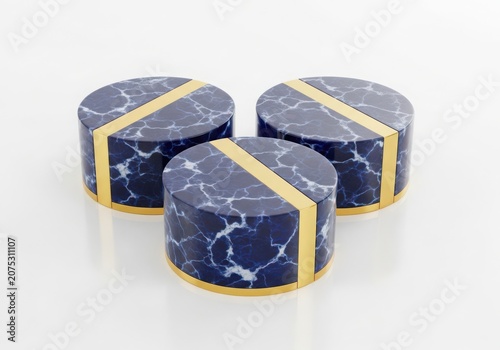 Three cylindrical objects with blue and gray marbled design