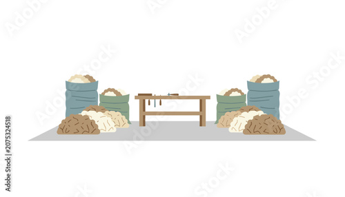 Rustic workshop scene featuring wooden workbench and various piles of natural fibers or materials stored in sacks for crafting projects.