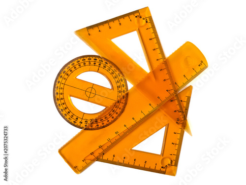 Foto Yellow plastic geometry ruler set on white background, serving as a conceptual background for geometry classes, architectural design, drafting, or school stationery