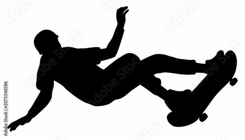 Fotografi Skateboarder performs 360 flip trick in mid air silhouette