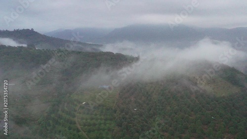 Lam Dong, Vietnam June 2026 beauty aerrial video of clouds over the mountains at Da Huoi, Bao Loc during early morning