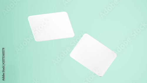 Double plain white business cards floating over Light Cyan background, 2 rectangular business cards with rounded corners. business card mockups