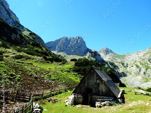 Durmitor national park wooden hut and mountains