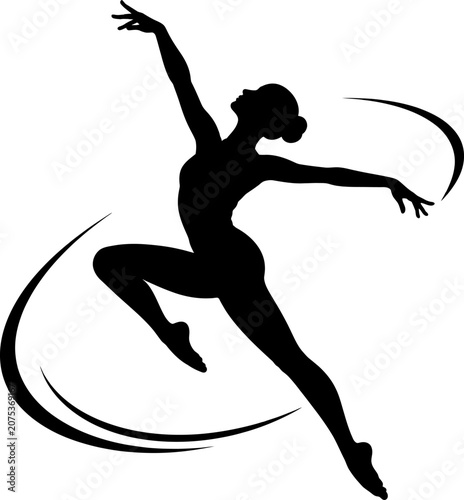 A dancer performs a dynamic leap with arms extended in a studio