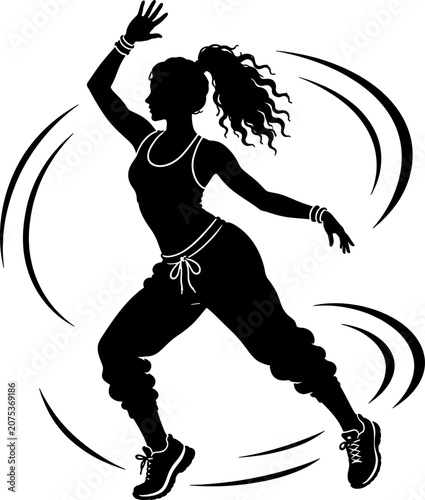 Woman dances energetically with raised arm and flowing hair in casual wear indoors.